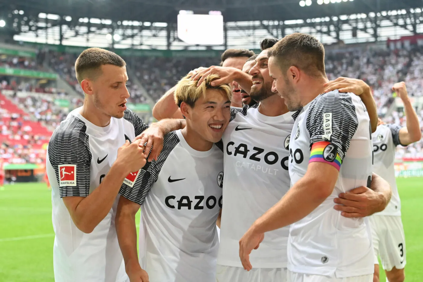 collective goaljubel around Ritsu DOAN (2nd from left, SC Freiburg) after goal to 0-4 with Maximilian EGGESTEIN (SC Freiburg, left), Vincenzo GRIFO (SC Freiburg), Christian GUENTER (SC Freiburg) jubilation, joy, enthusiasm, Action, football 1st Bundesliga season 2022/2023, 1st matchday, matchday01, FC Augsburg - SC Freiburg 0-4, on 08/06/2022 in WWK ARENA Augsburg. ? - Photo by Icon sport