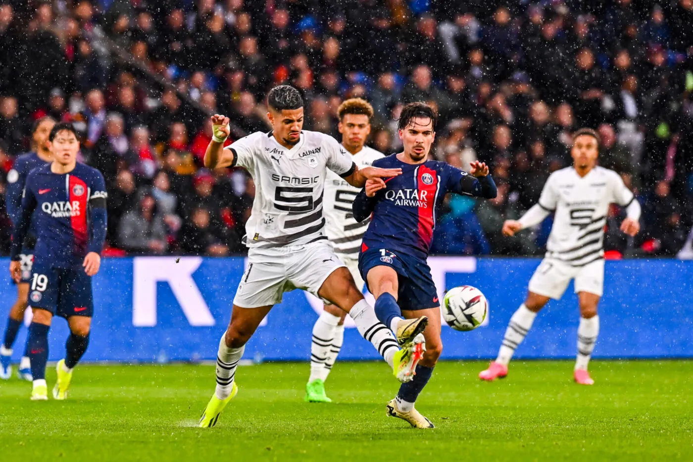 VITINHA of PSG and Ludovic BLAS of Rennes during the Ligue 1 Uber Eats match between Paris Saint-Germain Football Club and Stade Rennais Football Club at Parc des Princes on February 25, 2024 in Paris, France. (Photo by Daniel Derajinski/Icon Sport)