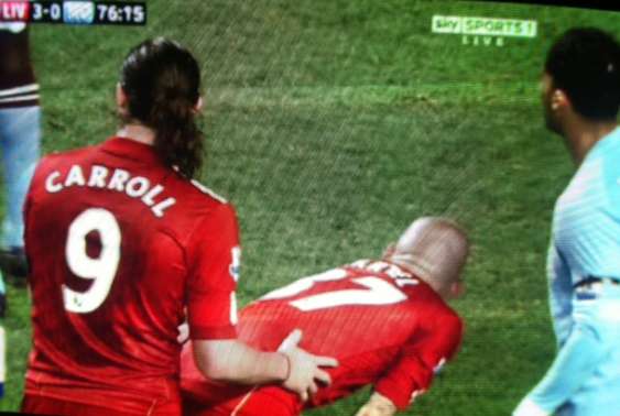 Photo : Carroll et Skrtel, si proches